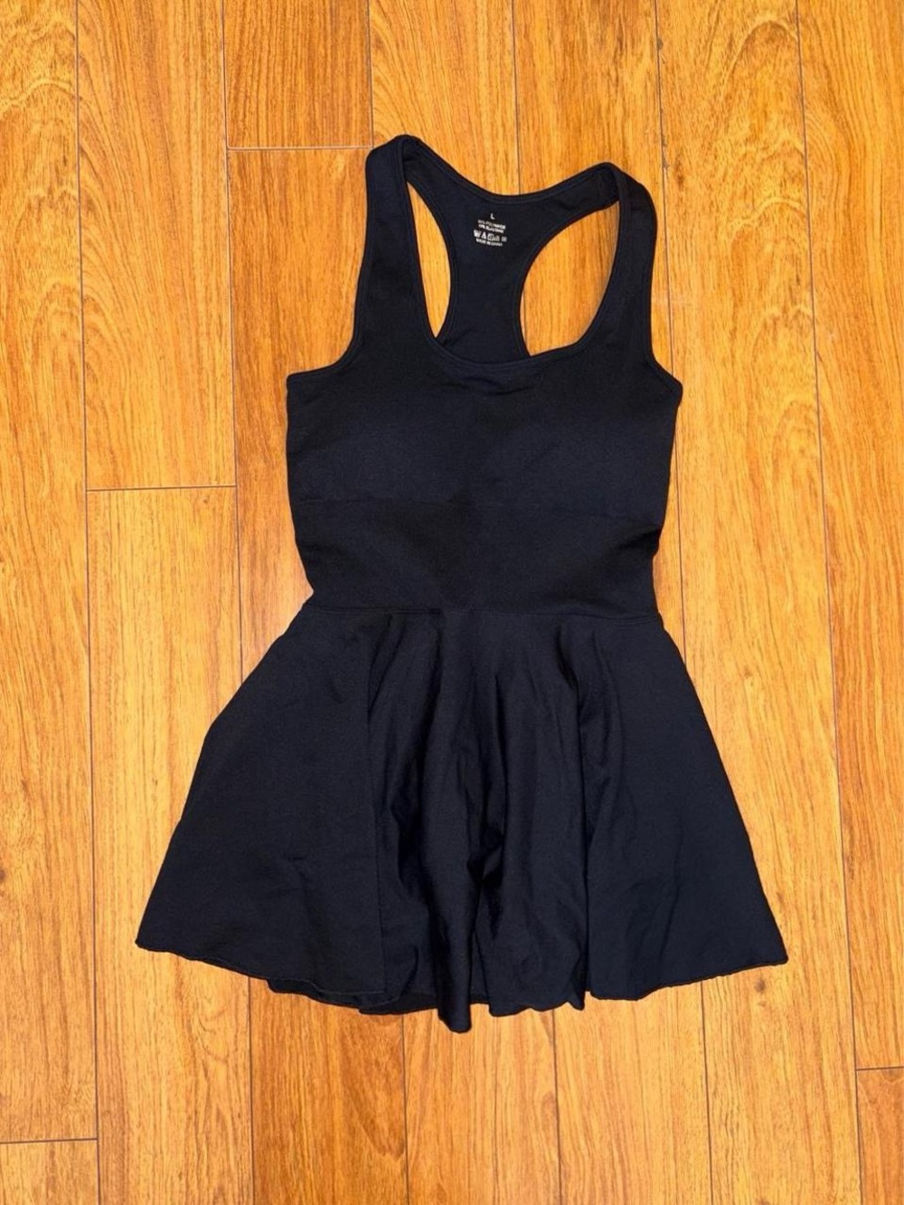 Black athletic style mini dress with padded top